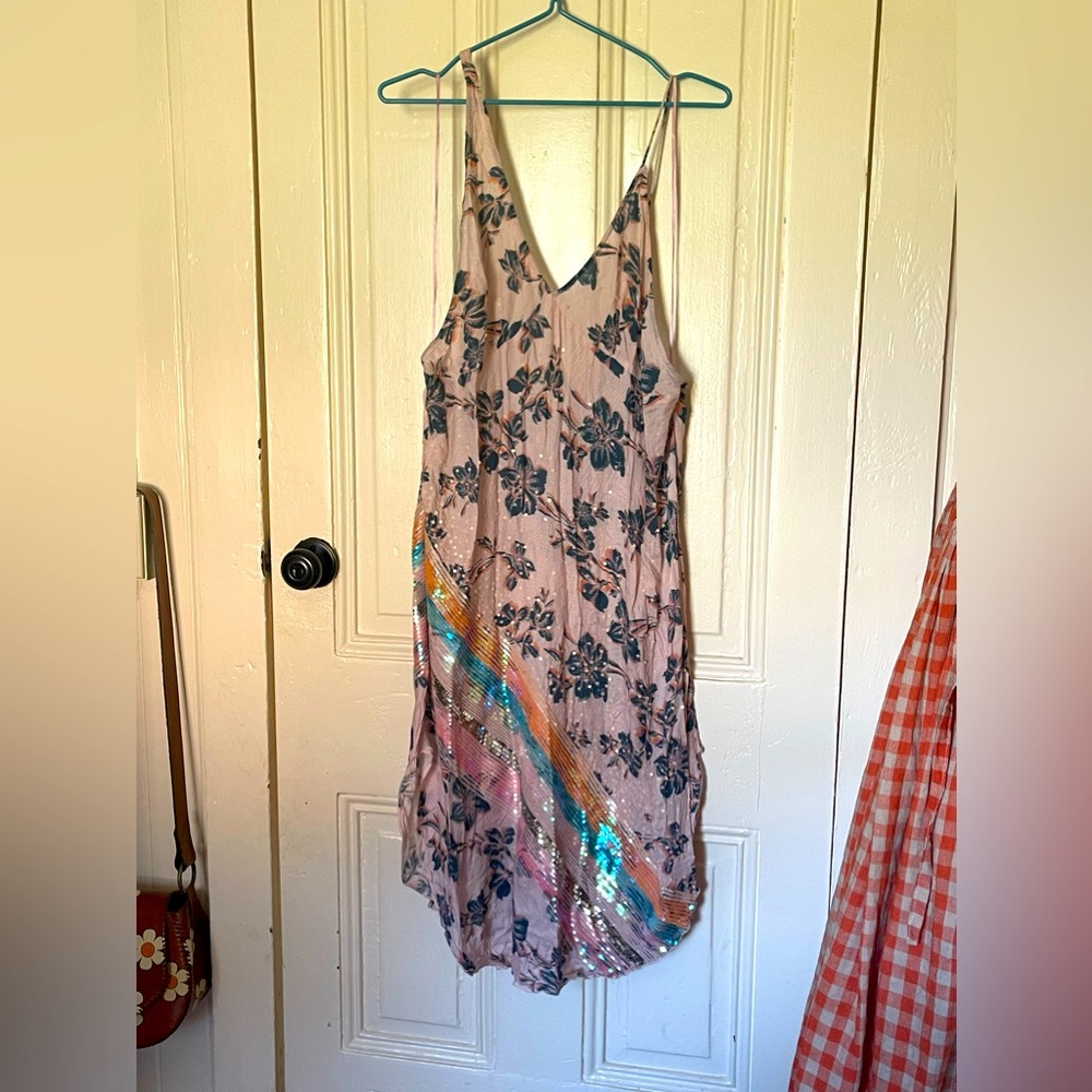 Free people sundress. Sequin details, side slits, asymmetrical straps. Size M